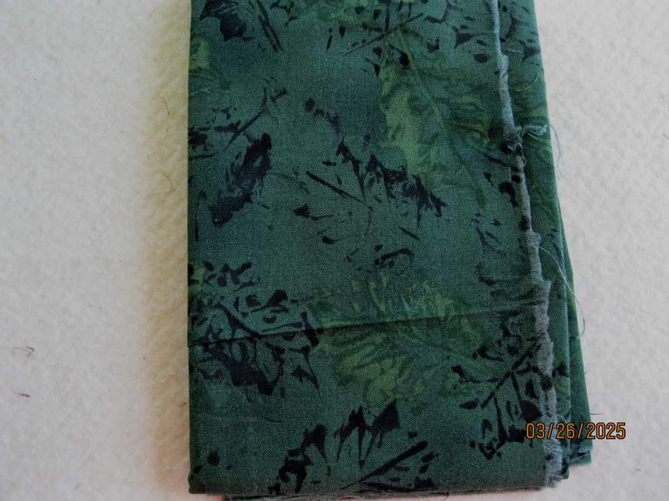 Shades of green with black leaf prints - Image 1 of 1