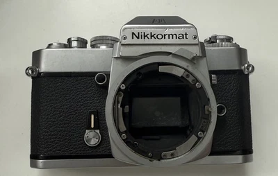 Black Nikkormat EL 35mm SLR for parts & Repair - Image 1 of 2