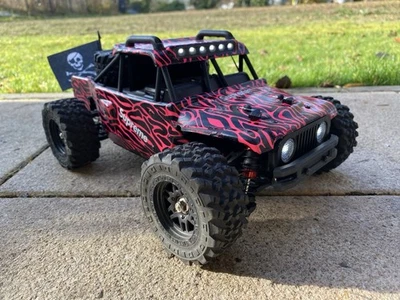 Custom Amewi 22658 Hyper Go Desert Buggy Brushless 4WD 1:14 RTR schwarz/rot - Bild 1 von 4