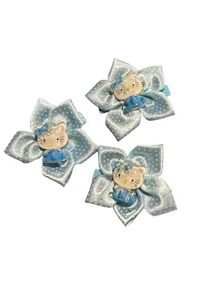 NEW hair accessories set of 3 blue hello kitty flowers - Image 1 of 3