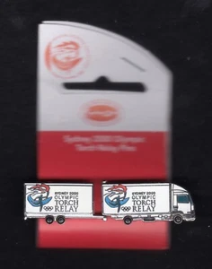 SYDNEY 2000 OLYMPIC GAMES. 2 PIN PUZZLE. TRUCK & TRAILER. TORCH RELAY. ON CARD - Picture 1 of 2