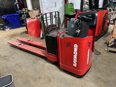 RAYMOND MODEL #890 JACK , 8000LB CAP , 24V W/ BATTERY & CHARGER 96" LONG FORKS - Image 1 of 4