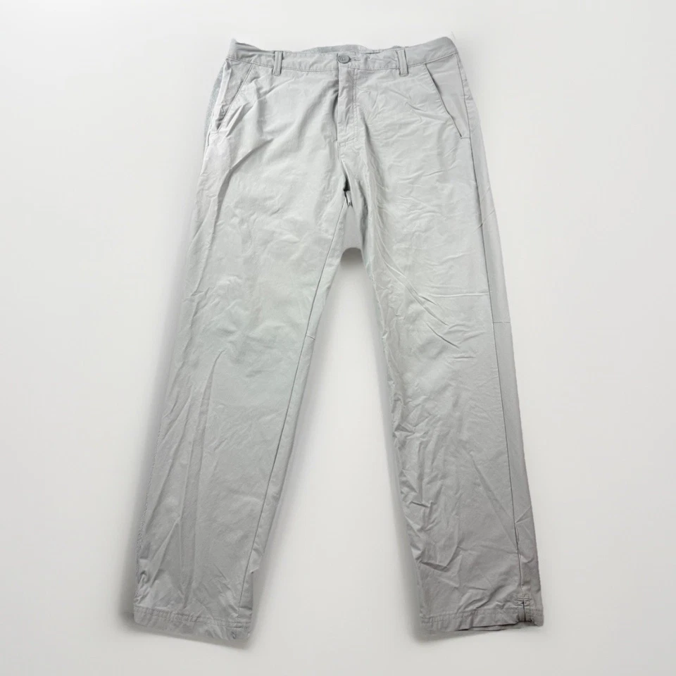 Pantalones elásticos de rendimiento de golf Oakley 33x30 gris calce regular para hombre Foto 1 de 4