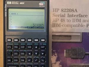 HP 48GX 128K Graphing Calculator + HP 82208a Serial Interface Kit + Ripoff Case - Picture 1 of 8