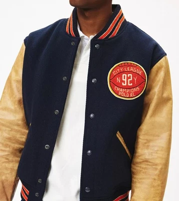 Chaqueta con parche de baloncesto universitario de lana y cuero roto Polo Ralph Lauren nueva con etiquetas Foto 1 de 4