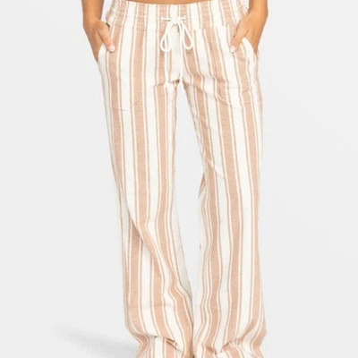 Pantalones de playa acampanados Roxy Oceanside para mujer pequeños tostadas Paradise a rayas mezcla de lino Foto 1 de 4