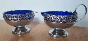 Vintage keltische Chrom Zuckerdose mit Fuß & Milchkännchen. Kobaltblaue Glaseinlagen. - Bild 1 von 15