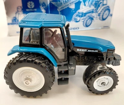 Vintage Ertl Toy Farmer New Holland 8260 Tractor 1/43 scale 1997 Farm Toy Show - Image 1 of 4
