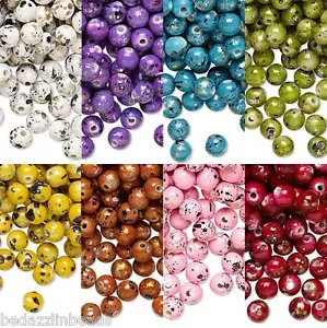 100 perlas redondas de acrílico plástico de 6 mm con manchas de pintura de oro moteado negro y plateado - Imagen 1 de 9