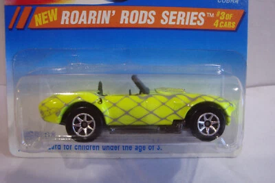 Hot Wheels Roarin' Rods Cobra (Shelby Cobra 427) negro brillante variación base Foto 1 de 4