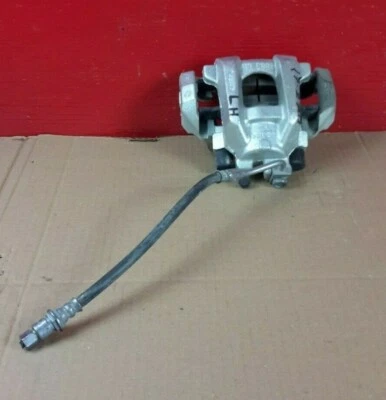 2017 Jeep Grand Cherokee Brake Caliper OEM Rear Left Driver Side - Image 1 of 4