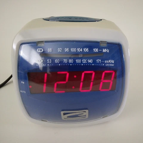 GT E219502 Radio Alarm Clock-AM/FM-Corded/Batt. Bkup-Blue IMac-Tested Works Cover