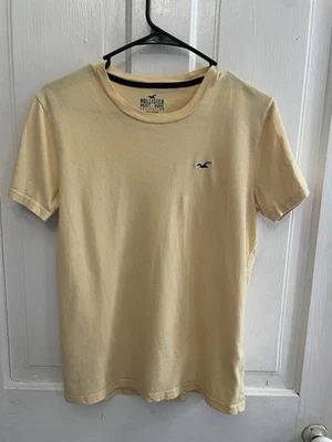 Camiseta Hollister Cuello Redondo Beige Mezcla Algodón Logo Para Hombre XS Camisa Escolar Foto 1 de 3
