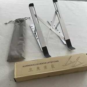 Soporte creativo para tableta portátil de aleación de aluminio nuevo con estuche - Imagen 1 de 8