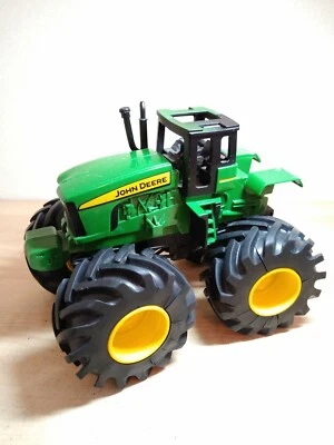 ERTL JOHN DEERE 9" MONSTER TREAD BATTERY OPERATED SHAKE & SOUND FARM TRACTOR - Image 1 of 4