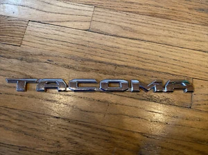 OEM 2016-2021 Toyota Tacoma 3D Emblem Chrome Length 13 1/2" 75427-04030 - Picture 1 of 7
