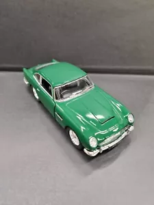 Auto Modello Kinsmart Aston Martin DB5 Verde 1/38 Scala Diecast Nuova - Foto 1 di 2