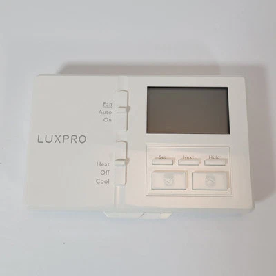LUX PRODUCTS Corp TX100E 7-Day Programmable Thermostat P711 - Image 1 of 4