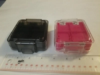 Dos (2) fundas rígidas transparentes para juegos Nintendo DS - rosa y gris Foto 1 de 4