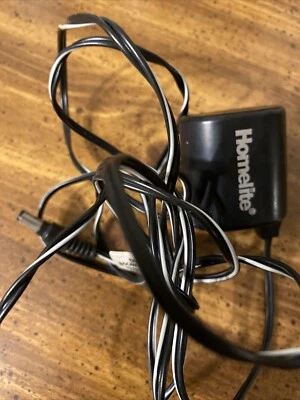 Cargador de batería recortadora de cuerdas NOS Homelite 03-01309-001 Foto 1 de 3