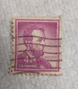 "BRIEFMARKE US PORTO 4 c. lila Abraham Lincoln "SELTEN" - Bild 1 von 2