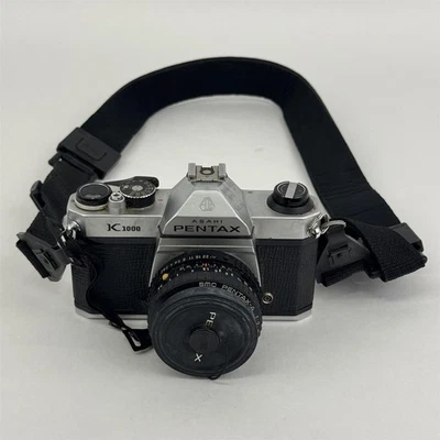 Cámara fotográfica Pentax Asahi K1000 35 mm con lente de 50 mm con correa para el hombro Foto 1 de 4