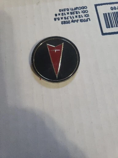 Nuevo de Lote Antiguo Original GM 1988-1991 Pontiac Grand Am Radiador Parrilla Escudo Emblema 22538891 Foto 1 de 1