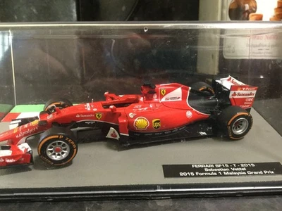 Panini 1/43 Sebastian Vettel Ferrari SF15-T 2015 Malaysia GP - Image 1 of 2