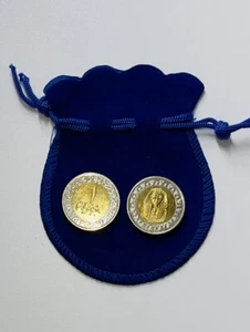 Egyptian Tutankhamun's mask centered in an ancient Egyptian lotus wreath 1 Pound - Picture 1 of 4
