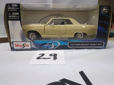 Chevy Malibu Muscle Car Maisto 1965 amarillo crema diecast escala 1:24 #HAC-29 Foto 1 de 4