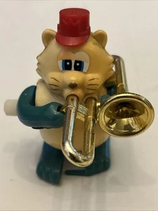 Vintage 1980s Tomy Plastic White Knob Wind Up Musical Walking Cat w/ Trombone - Picture 1 of 2