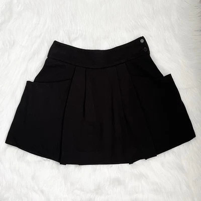 Lacoste Black Pleated Mini Skirt with Side Buttons Detail & Deep Pockets Sz 34 - Image 1 of 4