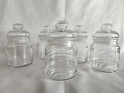 Tarros de boticario de vidrio transparente de 4" de alto con tapa esmerilada boca ancha bote caramelo Foto 1 de 4