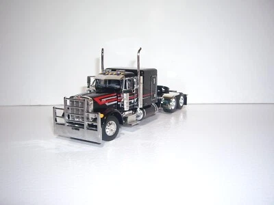 DCP FIRST GEAR 1/64 BLACK W/T RED & SILVER STRIPES PETERBILT 379 W/T 63" SLEEPER - Image 1 of 4