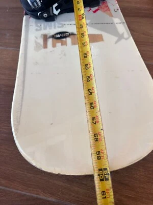 snowboard y fijaciones  Foto 1 de 4