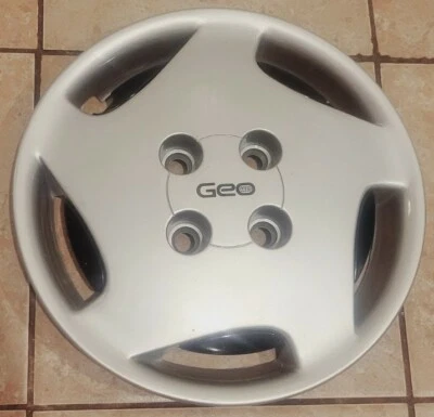 (1) Cubierta de rueda tapacubos atornillable Geo Prizm LSi 1991 fabricante original raro #0B p/n 10150809 Foto 1 de 4