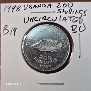 UGANDA 200 SHILLINGS 1998 OLD COIN B19 - Picture 1 of 2
