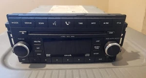 2007-2012 Chrysler Jeep Dodge Radio AUX MP3 CD Player 05064920AE WORKS - Foto 1 di 4