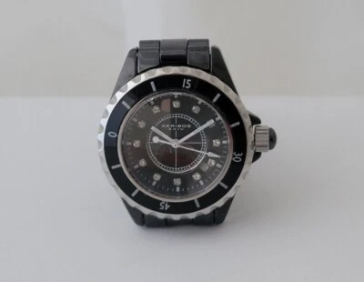 Reloj Akribos Damas Negro Cerámica Tono Plata 34mm Esfera Cristal Fecha Atornillado Foto 1 de 4