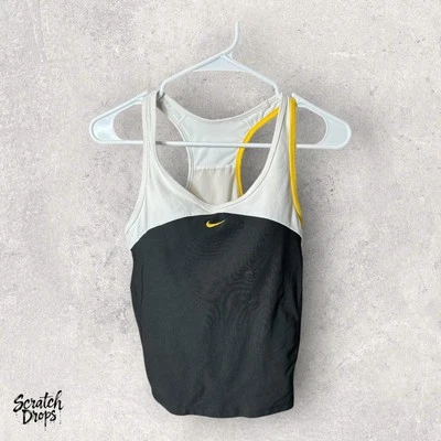 Camiseta sin mangas Nike Fit Dry Racer espalda talla mediana blanca y negra con ribete amarillo Foto 1 de 2