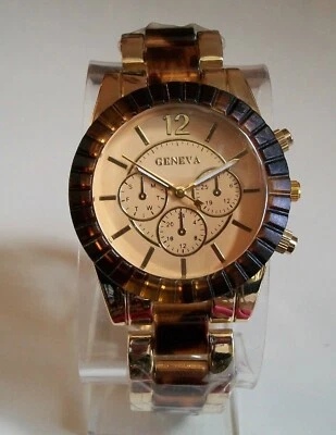 Reloj informal/vestidor para mujer con caparazón de tortuga acabado dorado moda novio Foto 1 de 4