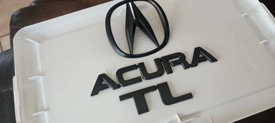 ACURA TL 2004-2008 PINTADO PRETO FOSCO OEM CONJUNTO DE EMBLEMA TRASEIRO USADO PELO FABRICANTE  - Imagem 1 de 4