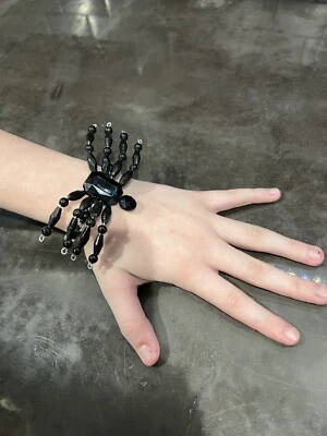 Banda elástica con cuentas de plástico tono negro y plateado tarántula araña Posable Foto 1 de 4