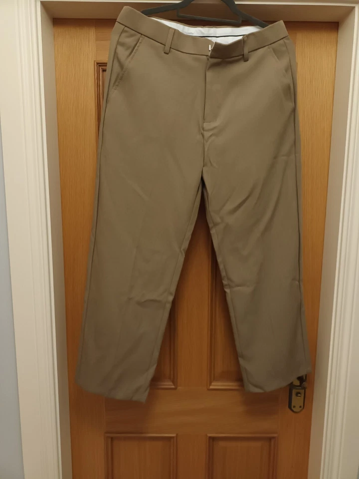 Pantalones de trabajo elegantes elegantes beige cintura 32 X 29 largo para hombre  Foto 1 de 4