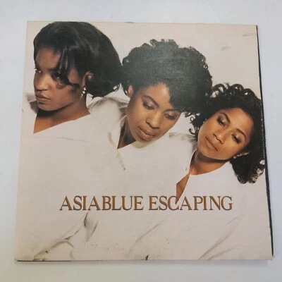 45 Record Asia Blue Escaping/I Want The Right (To Be Wrong) w/PS UK Import VG - Image 1 of 3
