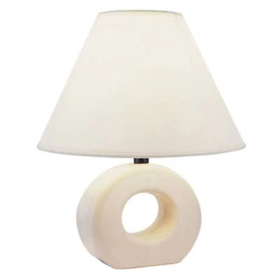 Pequeña lámpara de mesa de cerámica en acabado marfil para habitación infantil -12 pulgadas H. Foto 1 de 2