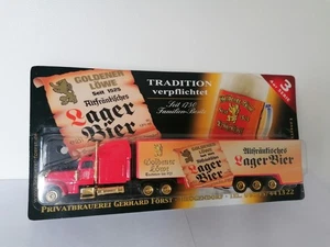 Mini camión publicitario Först Drügendorf, Freightliner FLD 120 SZ en embalaje original 3/4 - Imagen 1 de 8