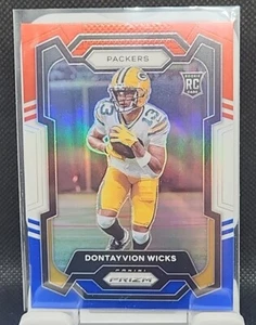 2023 Panini Prizm Football Dontayvion Wicks Rookie Red White & Blue Refractor RC - Picture 1 of 4