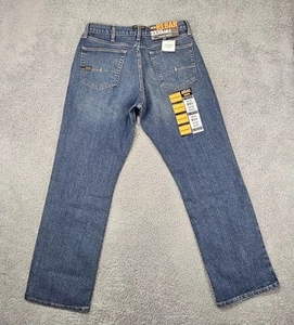 Pantalones de mezclilla de trabajo Ariat para hombre con barras de refuerzo M4 32x32 corte bota DuraStretch calce relajado nuevos con etiquetas - Imagen 1 de 14