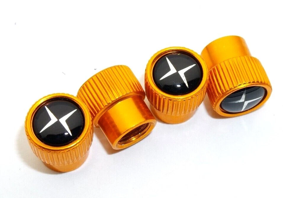 4 универсальных золотистых колпачка на воздушные клапаны колес Volvo для штока - Изображение 1 из 4